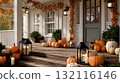 Cozy autumn porch decorated with pumpkins, candles, and orange leaves for seasonal celebration. The image represents fall atmosphere, warmth, and festive home decor 132116146