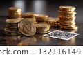 Stacks of golden bitcoin coins placed near a QR code on a reflective surface 132116149