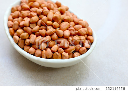 Raw peanuts with red skin 132116356