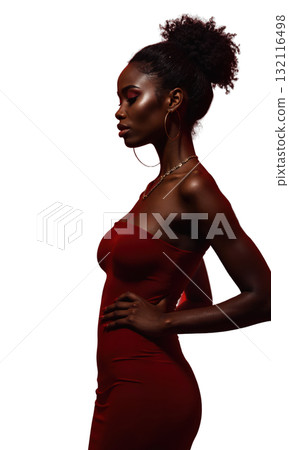 A Black female entrepreneur in radiant crimson, her stance powerful and poised, surrounded by glowing projections of corporate success, symbolizing A Black female entrepreneur in radiant crimson, her stance powerful and poised, surrounded by glowing projections of corporate success, symbolizing 132116498