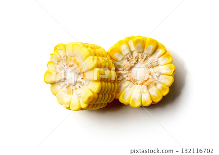 Sliced yellow corn on a white background. Sliced yellow corn on a white background. 132116702