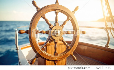 A wooden rudder shining on the ocean - a symbol of navigation and challenge 132119440