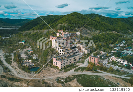 Aerial view of an abandoned mining and processing plant in a mountainous region Aerial view of an abandoned mining and processing plant in a mountainous region 132119560