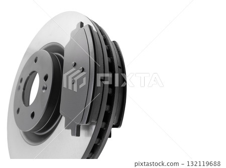 Brake discs and brake pads isolated on white background. Auto parts. Brake disc rotor isolated on white. Braking disk. Car part. Quality spare parts for car service or maintenance Brake discs and brake pads isolated on white background. Auto parts. Brake disc rotor isolated on white. Braking disk. Car part. Quality spare parts for car service or maintenance 132119688