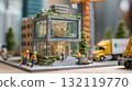 Miniature modern green building diorama with construction workers and eco-friendly landscaping 132119770