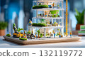 Miniature modern green building diorama with construction workers and eco-friendly landscaping 132119772