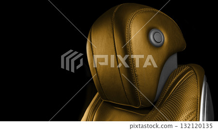 Car inside. Interior of prestige modern car. Comfortable gold leather seats. Perforarated leather with isolated black background. Car inside. Interior of prestige modern car. Comfortable gold leather seats. Perforarated leather with isolated black background. 132120135