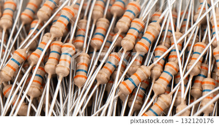 Electronic resistors texture background. Carbon film resistors background. Macro shot various electronic components 132120176