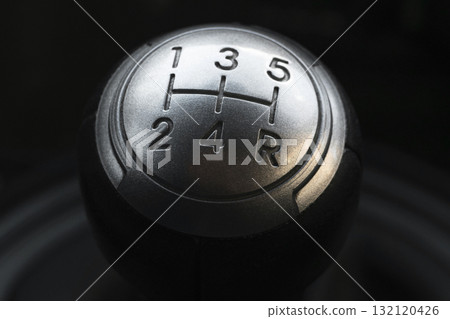 Close up view of a manual gear lever shift. Manual gearbox. Car interior details. Car transmission 132120426
