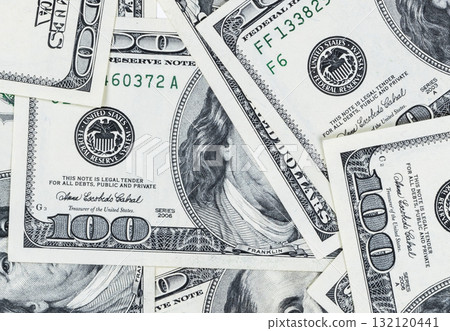 Stack of one hundred dollar bills. Stack of cash money in hundred dollar banknotes. Heap of hundred dollar bills background. Concept of financial success. Stack of one hundred dollar bills. Stack of cash money in hundred dollar banknotes. Heap of hundred dollar bills background. Concept of financial success. 132120441