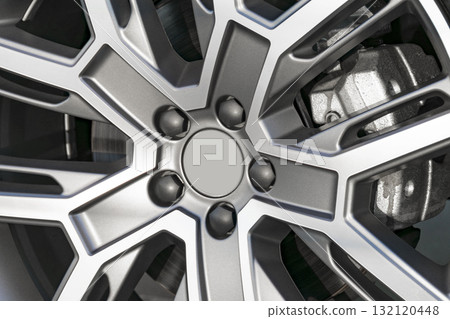 Alloy wheel of a modern car. Alloy rim. Car wheel disc. 132120448