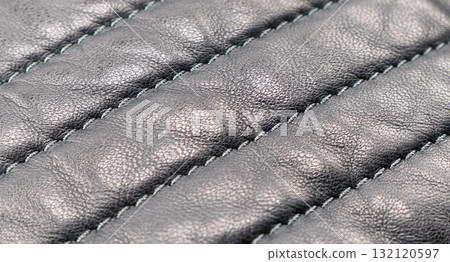 Macro shot leather texture background. Part of perforated leather details. Perforated leather texture background. Texture leather Macro shot leather texture background. Part of perforated leather details. Perforated leather texture background. Texture leather 132120597