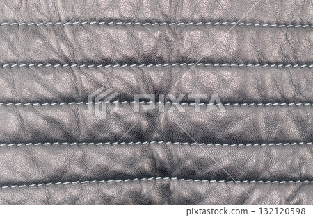 Macro shot leather texture background. Part of perforated leather details. Perforated leather texture background. Texture leather 132120598