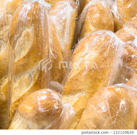 Buns in wicker basket. Composition with bread and rolls 132120620