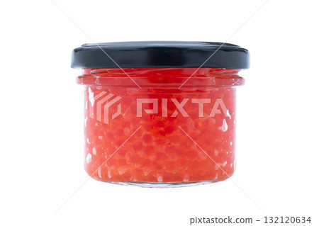 Red caviar in the glass jar isolated on a white background. Trout or salmon caviar close up. Macro shot. 132120634