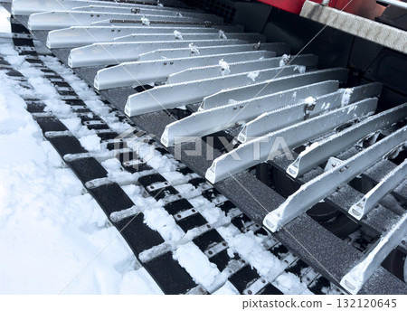 Snowcat machine for snow removal. Preparation ski trails. Snow groomer. Snowy tracks of snowcat in the mountains. Ratrac snowcat. Snow tucker 132120645