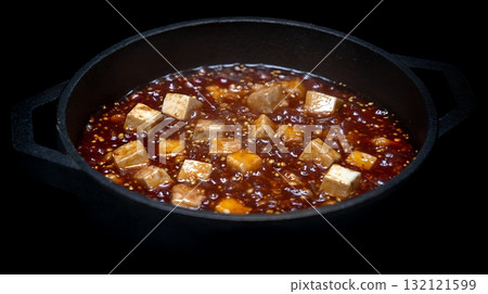 Close Up Of Delicious Tofu Dish Simmering In A Dark Cast Iron Pan. 132121599