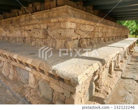 Dharmarajika complex minor stupa protected under shelter in taxila ruins Dharmarajika complex minor stupa protected under shelter in taxila ruins 132122246