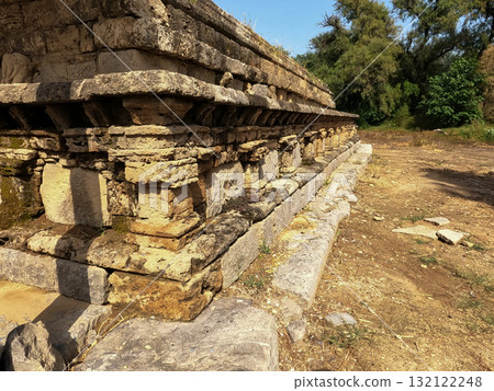 Dharmarajika complex side angle of minor stupa beside main stupa symbolizing buddhist rituals and ancient gandhara civilization in taxila ruins 132122248