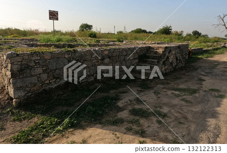 Ancient staircase leading to Sun Temple and Sun Dial in Sirkap Taxila Pakistan reflecting Buddhist ritual design and Gandhara architectural heritage 132122313