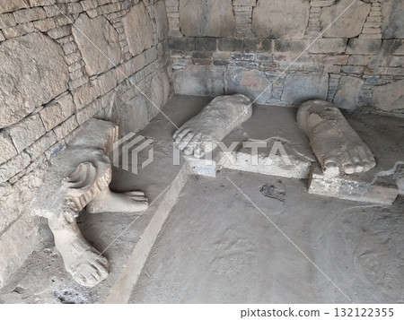 Buddha feet carved in ancient Dharmarajika site Taxila Pakistan showing sacred Buddhist heritage and spiritual symbolism Buddha feet carved in ancient Dharmarajika site Taxila Pakistan showing sacred Buddhist heritage and spiritual symbolism 132122355