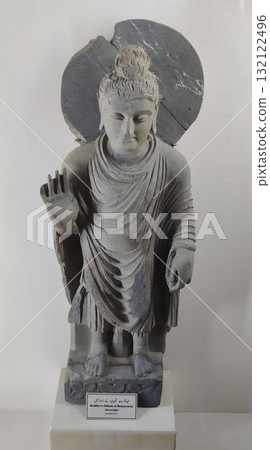 Historic Gandhara civilisation sculpture representing Buddhist art and Greco Roman heritage in ancient Taxila Historic Gandhara civilisation sculpture representing Buddhist art and Greco Roman heritage in ancient Taxila 132122496