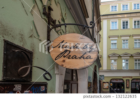 Made by Praha wooden sign on a historic street in Old town of Prague, Czech Republic Made by Praha wooden sign on a historic street in Old town of Prague, Czech Republic 132122635