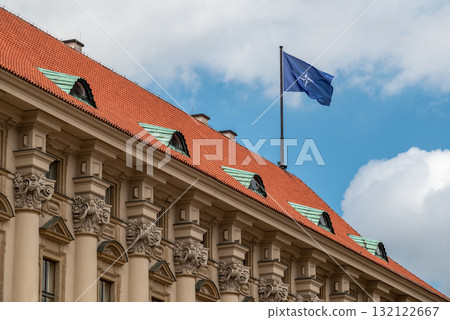 Flag of NATO Alliance flying on top of Ministry of Foreign Affairs building of Czechia in Prague, Czech Republic 132122667