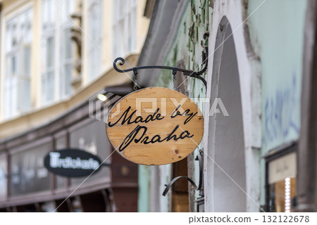 Made by Praha wooden sign on a historic street in Old town of Prague, Czech Republic Made by Praha wooden sign on a historic street in Old town of Prague, Czech Republic 132122678