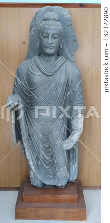 Buddha statue discovered from ancient ruins of Taxila Gandhara civilization preserved in original stone form Buddha statue discovered from ancient ruins of Taxila Gandhara civilization preserved in original stone form 132122890