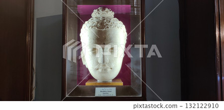 Buddha Head Sculpture Excavated in Taxila Depicts Gandharan Greco Buddhist Art with Kushan Era Spiritual Symbolism 132122910