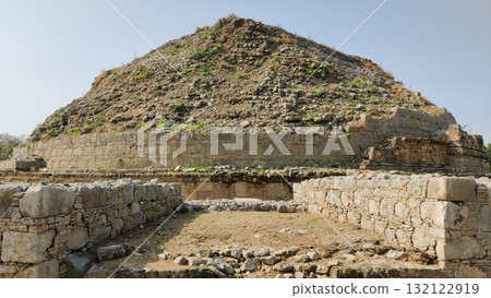 Panoramic view of Dharmarajika Stupa with ancient Buddhist ruins in Taxila 132122919
