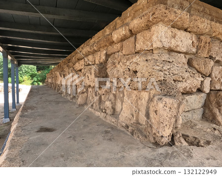 Ancient stupa ruins in shade at Dharmarajika Taxila 132122949
