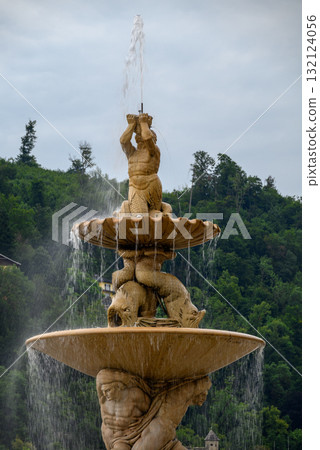 Residenzbrunnen fountain in Residenzplatz square in the historic centre Altstadt of Salzburg in Austria 132124056