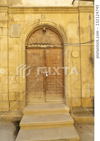Typical ancient entrance door of a house in Baku, Azerbaijan 132124745