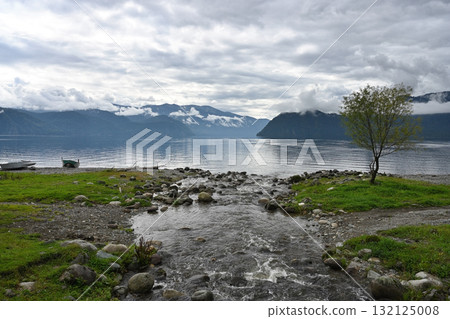 One of the many rivers flows into Lake Teletskoye. Altai Republic, Russia 132125008