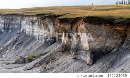 Permafrost layers exposed on eroding cliff, geological detail. Life in permafrost conditions, climate change problems on the planet. Global warming 132125089