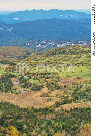 A spectacular autumn view from the parking lot where the monument marking the highest point on a national highway in Japan stands 132125932