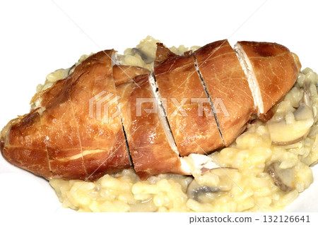 Prosciutto Wrapped Baked Chicken on risotto mushroom close up dinner 132126641