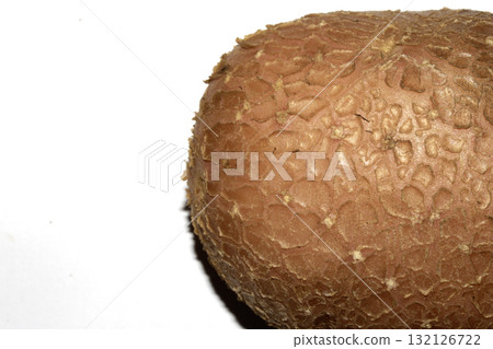 Potato grown in the garden with flaky skin scab fungus natural on white background 132126722