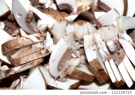 Close up of chopped chestnut mushrooms ready to be cooked fresh produce 132126725