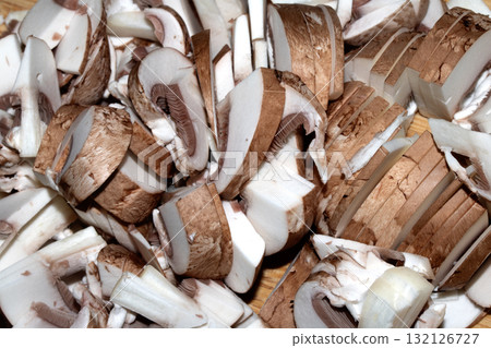 Close up of chopped chestnut mushrooms ready to be cooked fresh produce 132126727