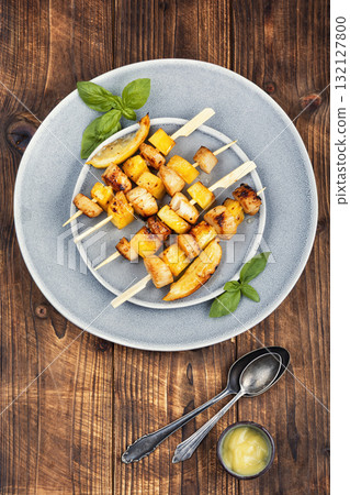 Succulent scallops cooking with pineapple. Succulent scallops cooking with pineapple. 132127800