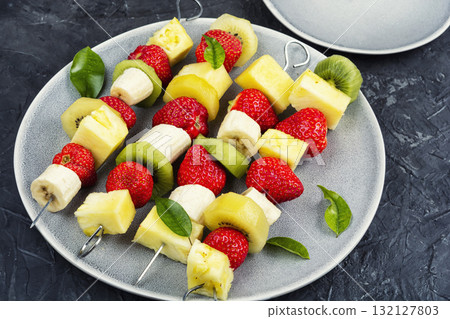 Fruit on skewer, mini snacks. 132127803