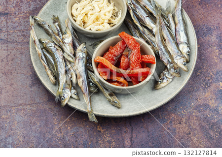 Unfiltered beer and with dried fish and squid. 132127814