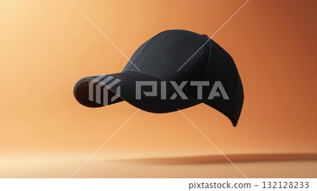 Floating black cap against a warm gradient background showcasing unique design 132128233