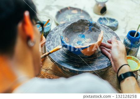Hand Painting Ceramic Pot in Art Workshop Hand Painting Ceramic Pot in Art Workshop 132128258