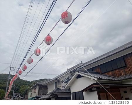 Red festival lanterns hanging on a Japanese-style building Red festival lanterns hanging on a Japanese-style building 132128350