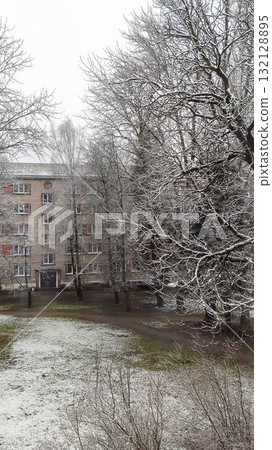 Cold winter day on Riga city street with snow. Cold winter day on Riga city street with snow. 132128895