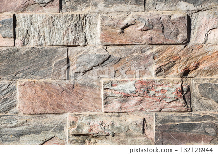 Stone background texture, masonry wall made of rock massif Stone background texture, masonry wall made of rock massif 132128944